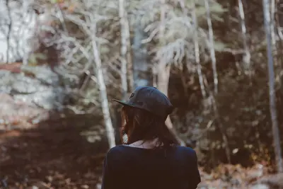Girl in forest (Unsplash)