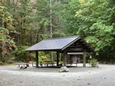 Photo of shelter at group site with picnic tables