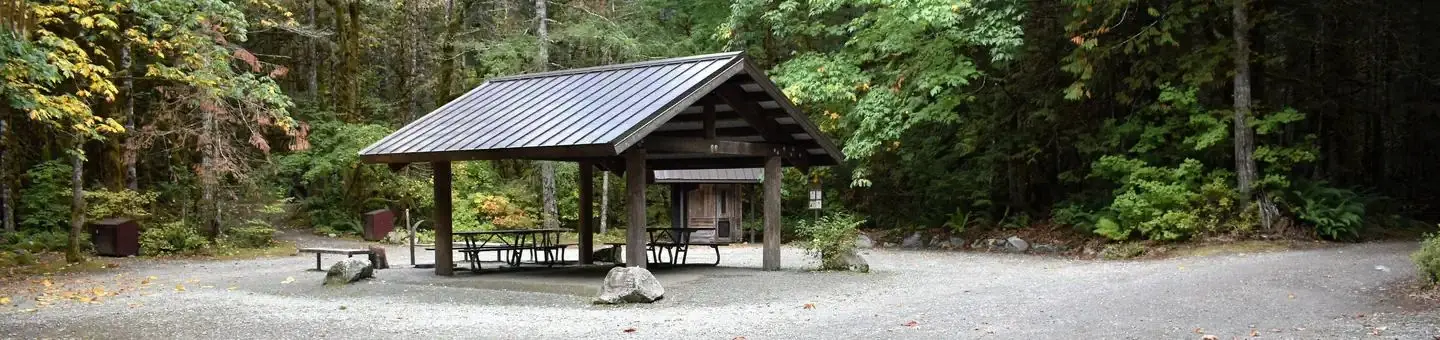 Photo of shelter at group site with picnic tables