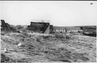 Damaged dam, with water flowing through it. Mound Lake, Minnesota. - NARA - 285937