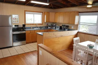 Kitchen area of a beach house.