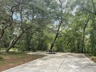 A photo of facility Big Bass Campground with two ADA campsites.