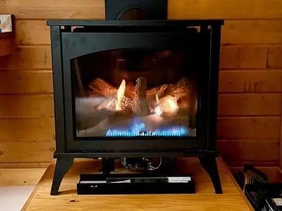 Propane fireplace in the cabin