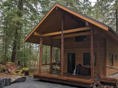 Open air front deck accessible by ramp.
