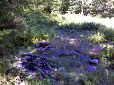 FLT M33 2.8 mi - Designated bivouac with fire ring 50 yards N of trail, follow yellow Tenting discs - panoramio