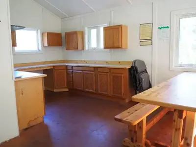 Deep Bay Cabin interior with cabinet and large countertop