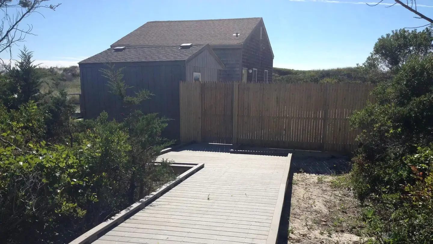 View of the Sailors Haven Cottage from the entry walk.
