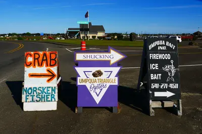 Three A-Frame Signs at the Entrance to Salmon Harbor Marina