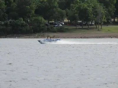 Boat along north shoreline - Blue Bill