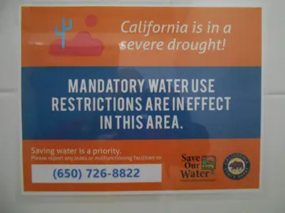Water conservation signs in restroom and shower areas of Half Moon Bay State Park (21502674320)