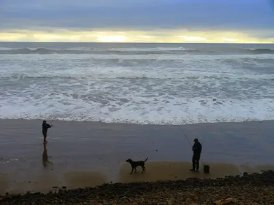 Surf fishing in the day use area at Cape Lookout State Park