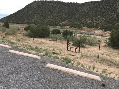 A new trail gate is installed at the visitors parking lot at Diablo Canyon in Santa Fe County, NM (2d824b2a-3eb3-4e2f-8051-599b6bf746ff)