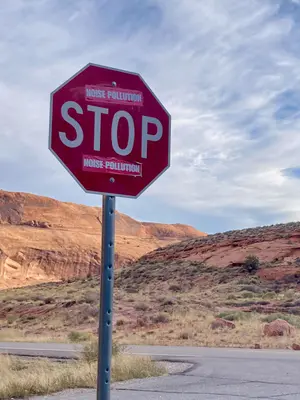 "Stop noise pollution" road sign in Moab, Utah