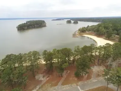 Aerial view of Cottonhill Campground looking over campsites in foreground to Walter F. George Lake in background.