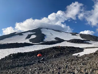 Tents at Lunch Counter on Mount Adams as clouds surround summit