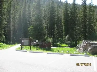 Langohr Campground trailhead, bridge to trail, signs & pine trees