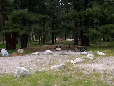 All campsites are surrounded by pine trees and have picnic tables, BBQ stands with gravel parking area and not far for hiking, biking, fishing, rafting and swimming.