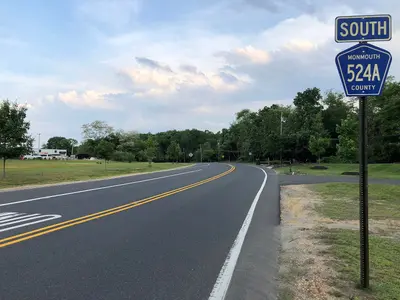 2018-05-26 19 13 12 View south along Monmouth County Route 524 Alternate (Squankum-Yellowbrook Road) at Monmouth County Route 524 (Adelphia Road) in Howell Township, Monmouth County, New Jersey