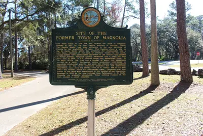 Site of the Former Town of Magnolia historical marker (back), Newport