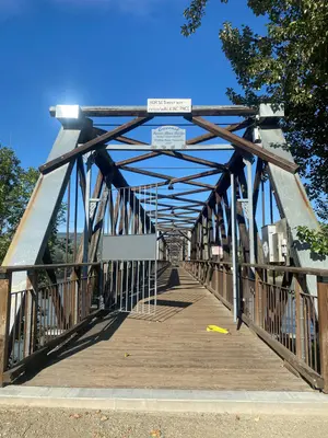 Eastern gate of Quesnel Fraser River Foot Bridge left opened