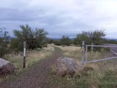 Grapevine trailhead between two large rocks