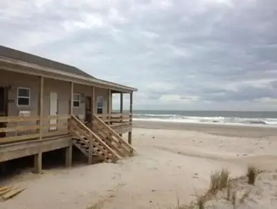 Long Point Cabin Camp with beach in the background