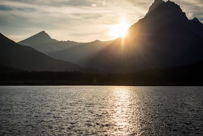 Sunset over swiftcurrent lake - glacier NP (33651984751)