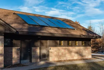 Solar Panels on Campground Shower Building - St. Croix State Park, Minnesota (31424586887)