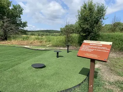 Unique to Keystone Lake, a mile long fitness trail located in Brush Creek offers obstacles. Featured is the plyo platforms station which is located at one of four stations on the trail.