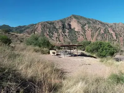 Campsite R, situated on a slope amidst the mountains