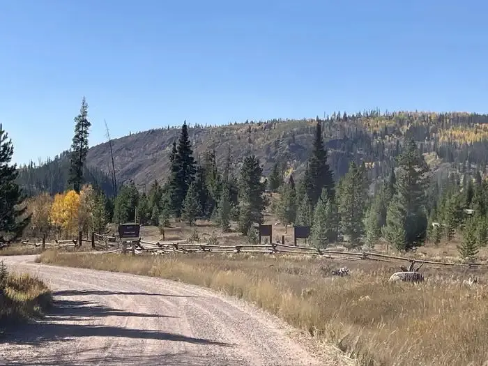 Hinman CG  fence, rocks and trees