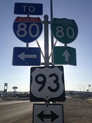 2014-06-10 18 08 34 Signs for Interstate 80, Business Loop 80 and U.S. Route 93 on 6th Street (Nevada State Route 223) westbound approaching U.S. Route 93 in Wells, Nevada
