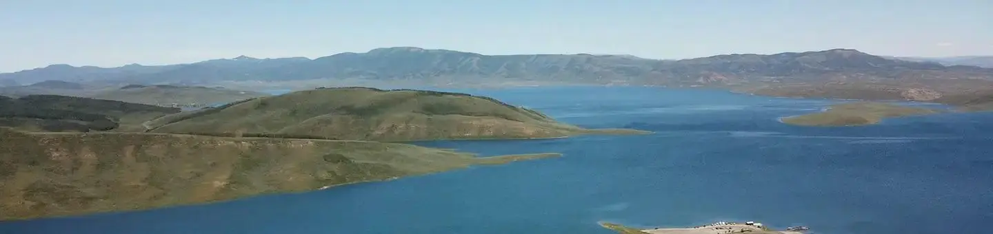 Panorama of a blue mountain lake