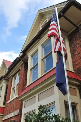 June Tolliver House with flag