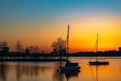 Sailboats on the River - Flickr - Corey Leopold