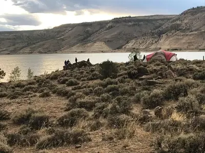 Tent Campers admire the Blue Mesa Reservoir shore from Elk Creek Campground
