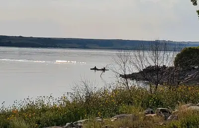 Kayakers heading out on the water from Beaver Creek Boat Ramp.