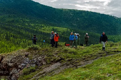 Hikers overlooking confluence of Firth River and Joe Creek, Ivvavik National Park, YT 2