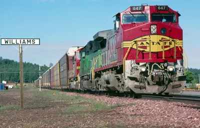 A northbound Santa Fe autotrain coming off the Peavine branch at Williams, Arizona, August 1997