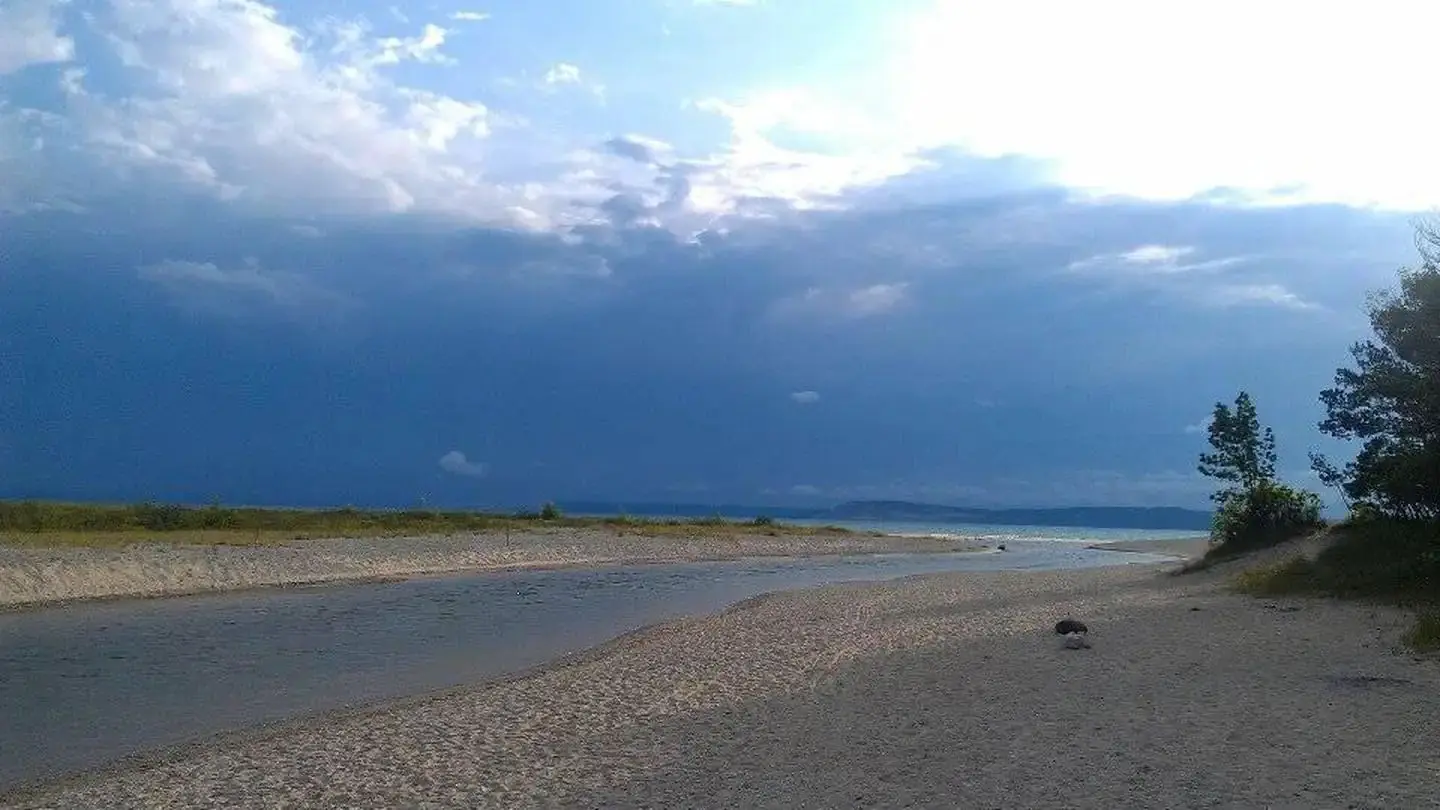 Storm clouds moving over the Platte Point Beach
