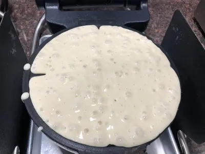2022-04-30 06 39 25 Waffle batter ready for heating in a waffle iron at the Wingate by Wyndham hotel in Chantilly, Fairfax County, Virginia
