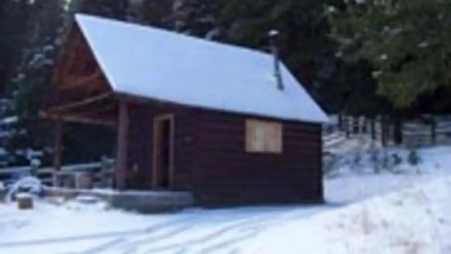 View of Indian Flats Cabin during the winter with snow on the ground