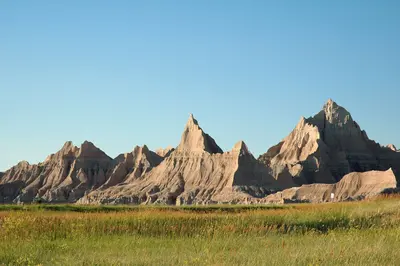 View of badland formations during golden hour from Cedar Pass Campground, Badlands National Park, 2009