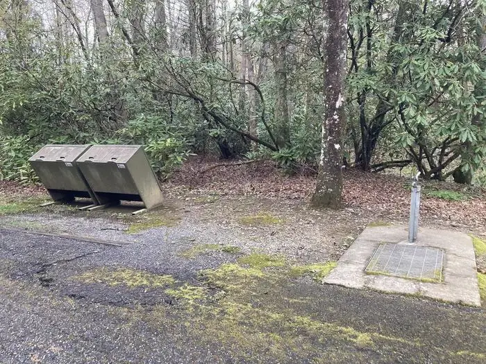 Water spigot and trash receptacles