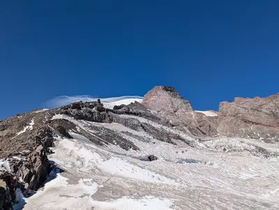 Looking up from Camp Muir to the source of Cowlitz Glacier and Gibraltar Rock (6 October 2024)