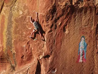 Climber and Pictograph in Penitente Canyon