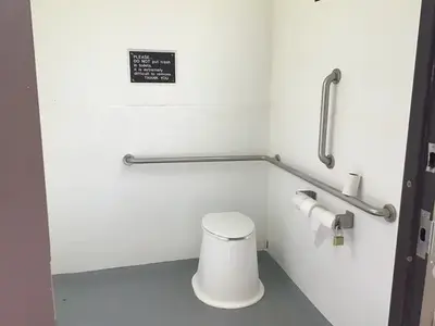 Accessible vault toilet within Sedalia Campground