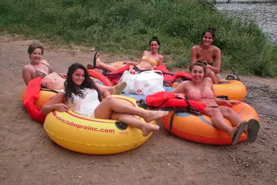 Group posing for a photo on tubes (50856768751)