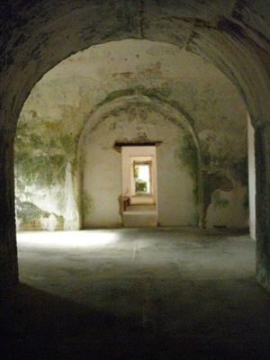 Triple Archway with mineral deposits on walls