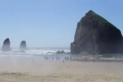 Haystack Rock and Needles in fog at Cannon Beach